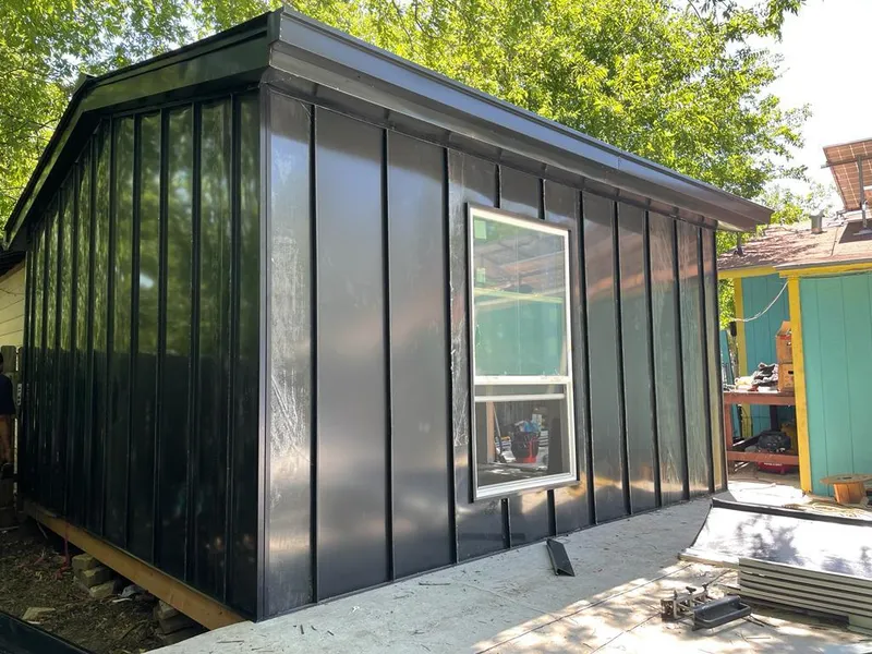 Black standing seam metal wall panels for Roof Inspection in Wesley Chapel